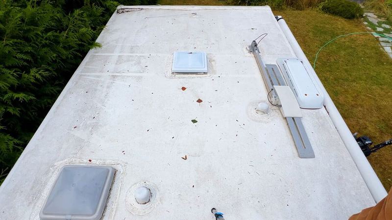 Travel trailer roof cleaned — before